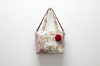 Floral print hand with sling bag