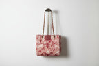 Knitted Floral Hand Held Handbag with adjustable strap