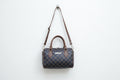 Stylish brown checkered sling Bag