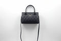 Black checkered hand with sling Bag
