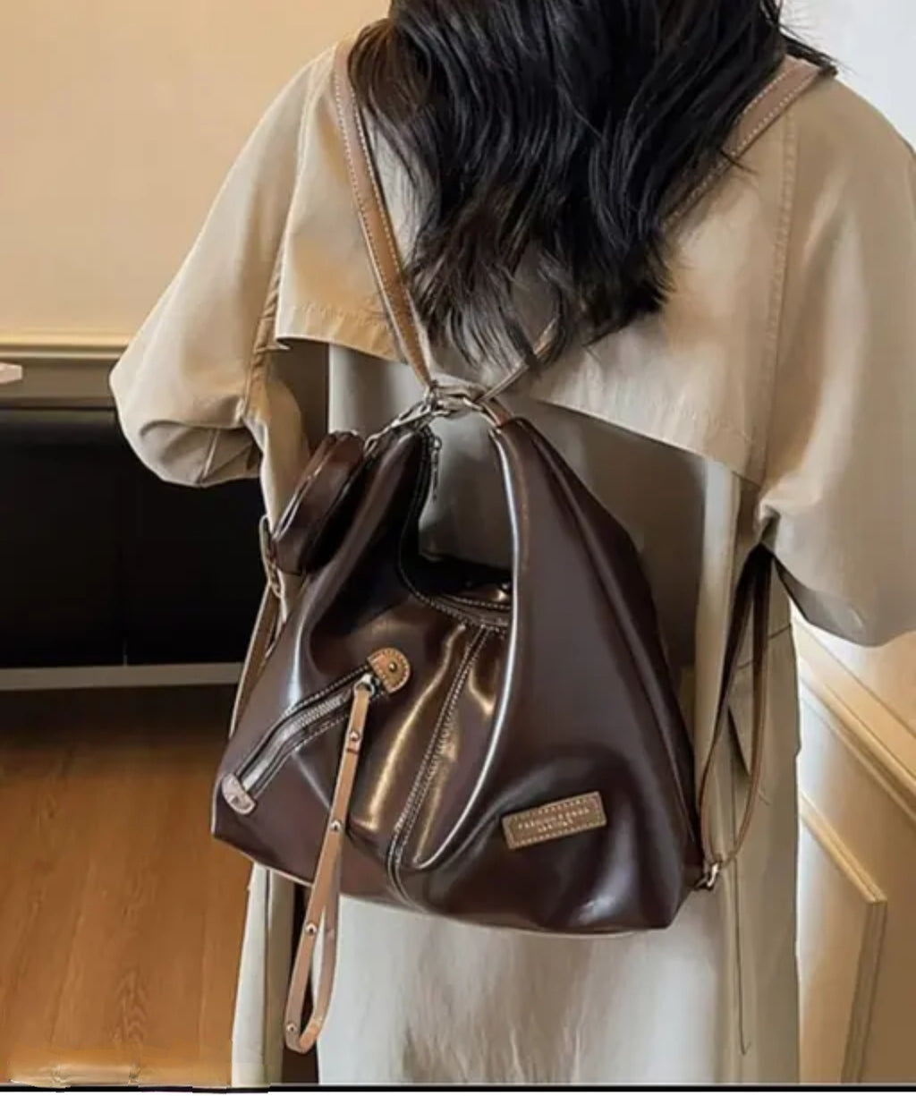 Hand and Backpack